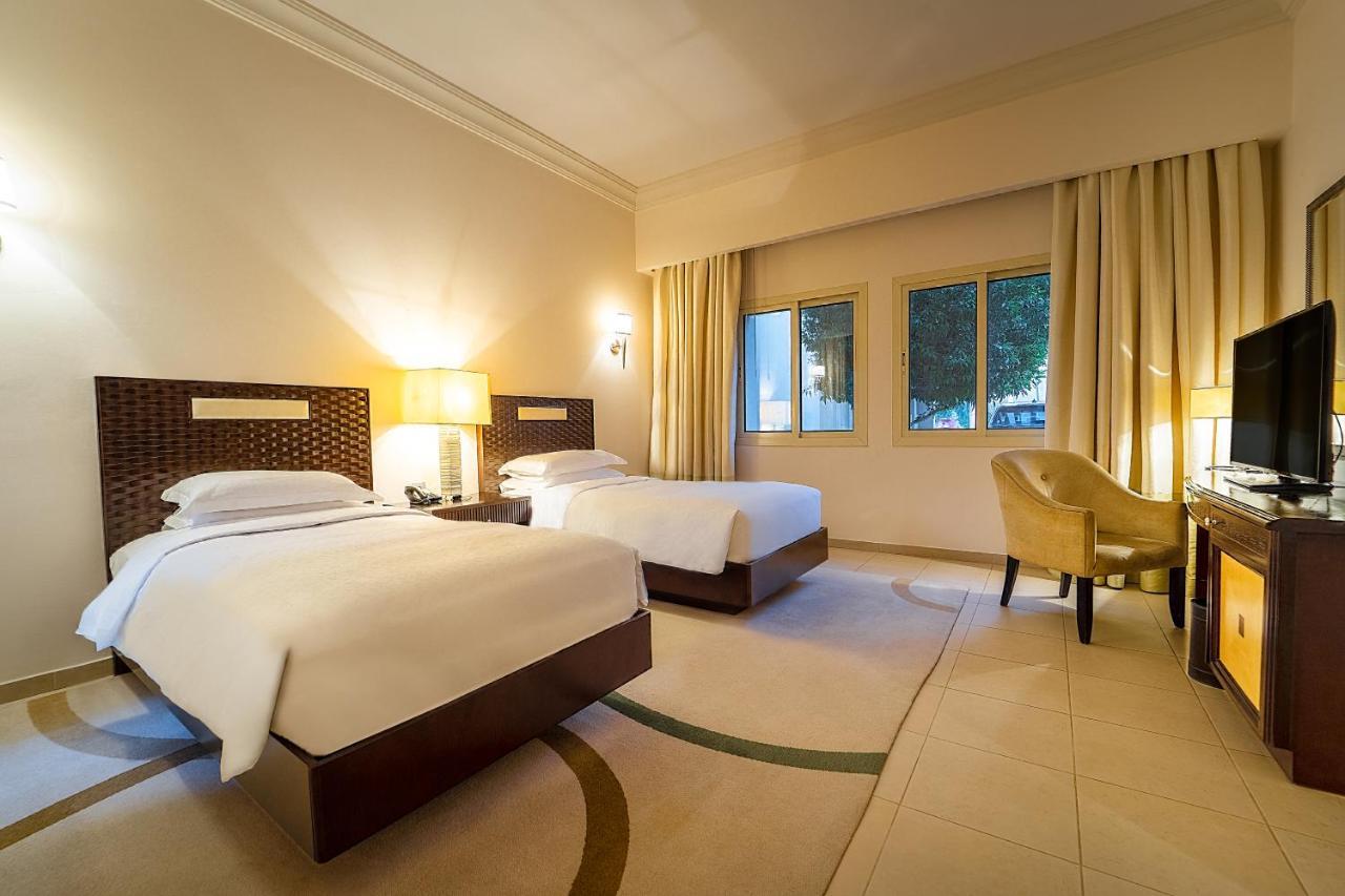แกรนด์ ไฮแอท โดฮา Hotel ภายนอก รูปภาพ A room at the hotel
